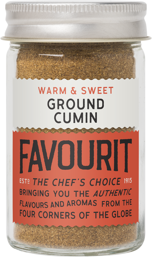 A jar labeled "Warm & Sweet Ground Cumin" with the brand name "Favourit" and text promoting authentic flavors from around the globe.