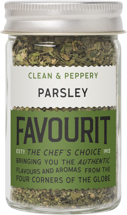 A glass jar of "Favourit" brand parsley with green and white labels, featuring text about its clean and peppery flavor.